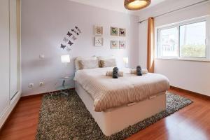 Ένα ή περισσότερα κρεβάτια σε δωμάτιο στο Casa Verao +16 φωτογραφίες