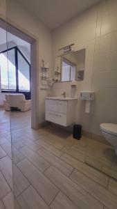 Koupelna v ubytování Hotel Konopielka