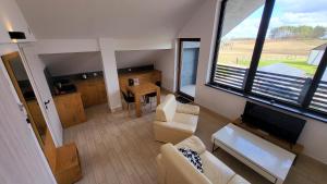 TV a/nebo společenská místnost v ubytování Hotel Konopielka