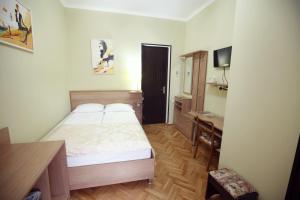Letto o letti in una camera di Silver Hotel
