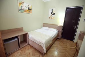 Letto o letti in una camera di Silver Hotel