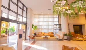 Zona de estar de Flat 1804 NOVO Itaim Bibi THE CAPITAL