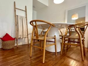 a dining room with a table and chairs at Ipanema Beach lovely apartment in Rio de Janeiro