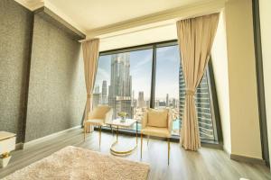 منطقة جلوس في FIRST CLASS 3BR with full BURJ KHALIFA and FOUNTAIN VIEW