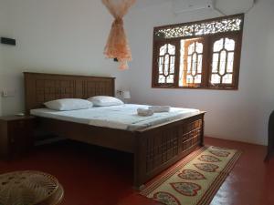 Postel nebo postele na pokoji v ubytování Nature Villa