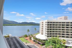 a view of the lake from the balcony of a hotel at City Living at Harbour Lights in Cairns