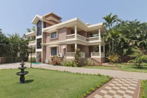 Aed väljaspool majutusasutust De Mandarin Beach Resort Suites & Villas, Candolim