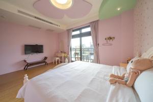 TV i/ili multimedijalni sistem u objektu Tian Nian B&B