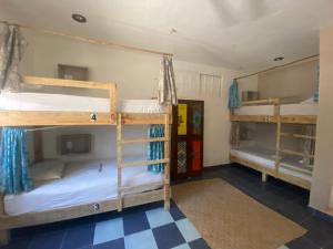 Postel nebo postele na pokoji v ubytování Barco Verde Hostel