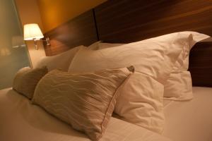 Letto o letti in una camera di Pine Tree Hotel