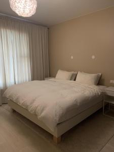Postel nebo postele na pokoji v ubytování Apartment in Kópavogur