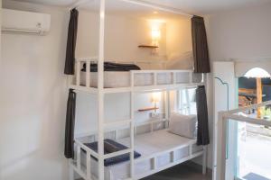 Postel nebo postele na pokoji v ubytování In Da Lodge