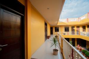 Balkón nebo terasa v ubytování RedDoorz Syariah @ Jalan Gajah Mada Meulaboh
