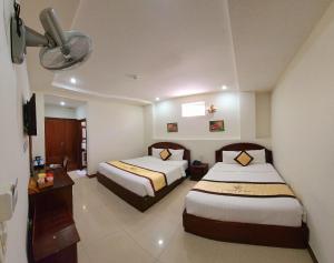 Cama o camas de una habitación en Marguerite Dalat Hotel