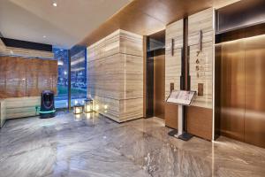 Ένα μπάνιο στο Dongguan Tangxia Huaman Hotel