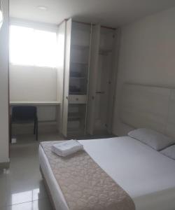 Voodi või voodid majutusasutuse HOTEL DON QUIJOTE toas