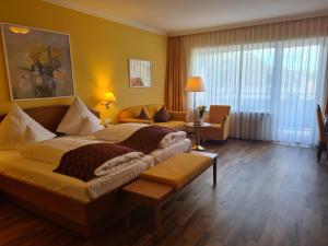 Postel nebo postele na pokoji v ubytování Hotel Anna