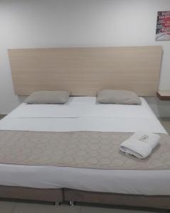 Voodi või voodid majutusasutuse HOTEL DON QUIJOTE toas