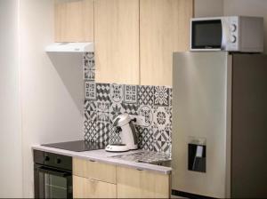 Köök või kööginurk majutusasutuses Le Boldieu- Duplex Béziers -allée Paul Riquet- Wifi- Tv connecté