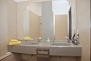 Koupelna v ubytování GS Hotel Mindelheim + 27 fotografií