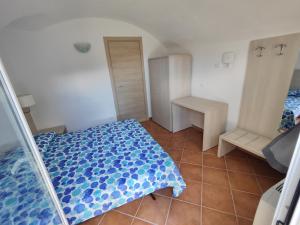 Postel nebo postele na pokoji v ubytování il gelsomino