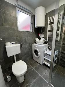Koupelna v ubytování Apartman Plasse + 31 fotografií