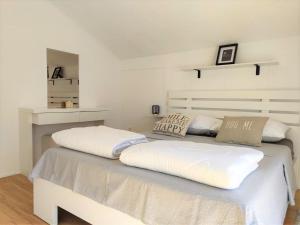 Postel nebo postele na pokoji v ubytování Apartments Helena