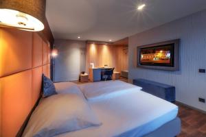 Cama ou camas em um quarto em Hotel Cult Frankfurt City