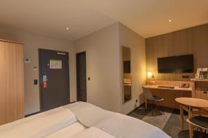 A cozinha ou cozinha compacta de Hotel Cult Frankfurt City