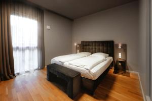 Cama ou camas em um quarto em Hotel Cult Frankfurt City