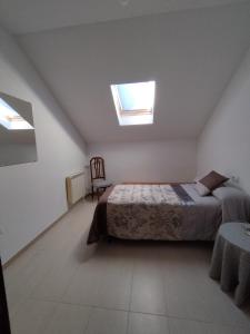 Postel nebo postele na pokoji v ubytování Piso turíticos centrico