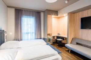 Cama ou camas em um quarto em Hotel Cult Frankfurt City