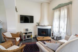 TV a/nebo společenská místnost v ubytování Carissa house in Crete
