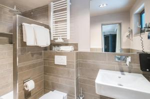 Um banheiro em Hotel Cult Frankfurt City