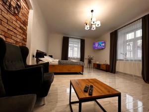 Гостиная зона в Apartament Grodzki