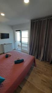 Postel nebo postele na pokoji v ubytování Appartement lumineux et central