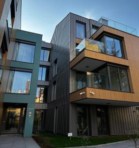 an image of a building with glass at Monte 27 Lux Apartments in Sopot