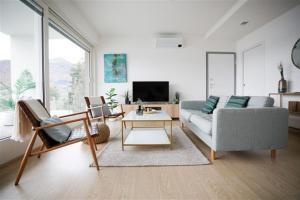 A television and/or entertainment centre at IseoLakeRental - Trivia Bellavista