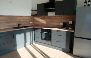Kuchyň nebo kuchyňský kout v ubytování Ferienwohnung Taubertraum