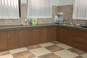 Kuchyň nebo kuchyňský kout v ubytování Villa Otti, Batu