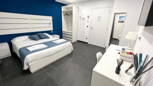 Postel nebo postele na pokoji v ubytování Soave Rooms