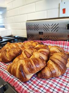 a bunch of croissants sitting on a table at St Breca in Newquay