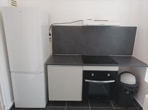 Kuchyňa alebo kuchynka v ubytovaní O'Couvent - Appartement 87 m2 - 4 chambres - A501