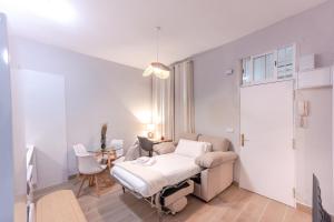 Postel nebo postele na pokoji v ubytování For You Rentals Bonito y exclusivo apartamento TEMPORAL en Embajadores Madrid AMP98