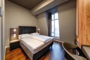Cama ou camas em um quarto em Hotel Cult Frankfurt City
