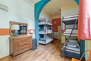 Posteľ alebo postele v izbe v ubytovaní Ostello Bello Firenze