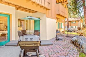 a grill on the patio of a house at Alpine Oasis in Leavenworth