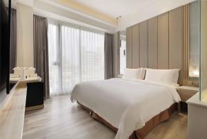 Katil atau katil-katil dalam bilik di Gamalan Star Hotel