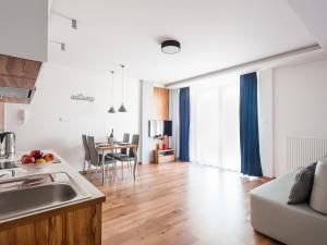 Posezení v ubytování Marina Plaza Apartamenty