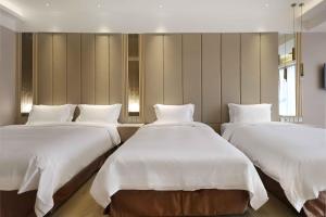 Katil atau katil-katil dalam bilik di Gamalan Star Hotel
